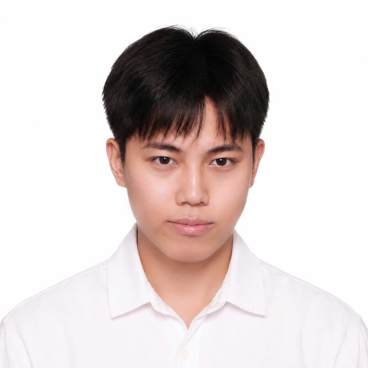 Portrait of Thắng Lê in a white shirt